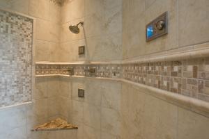 detail of custom tile in walk-in shower