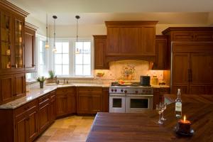 kitchen with tile floors wood cabinets and kitchen island