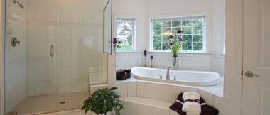 bathroom with walk-in shower and jacuzzi tub