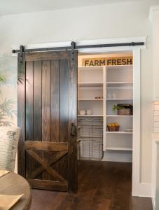 walk-in pantry with sliding barn door