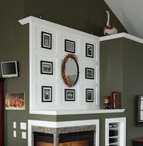 gallery wall above a fireplace