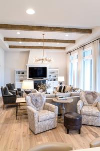 living room with built-in entertainment center and fireplace