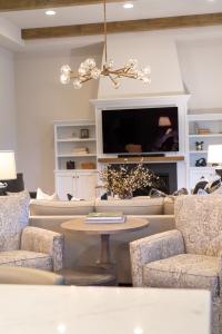 living room with built-in entertainment center and fireplace