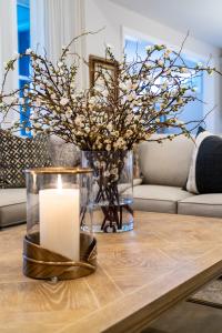 plant and candle on a coffee table