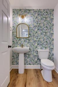 wallpaper accent wall in powder room