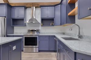 kitchen with dark blue cabinets