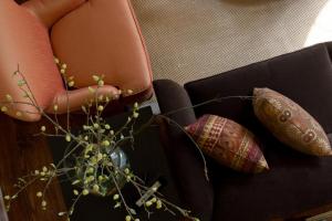 view from above of couch, side table, and chair in a living room