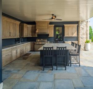 outdoor kitchen and dining area