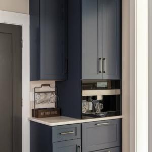 narrow dark blue cabinets and sideboard to create drink station