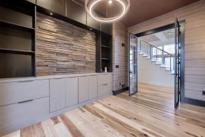 built-in-shelves and reclaimed wood accent wall