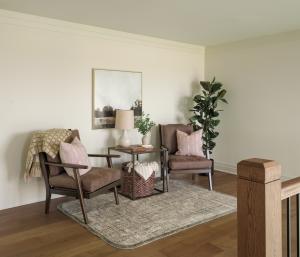 sitting area on upper interior landing with balcony
